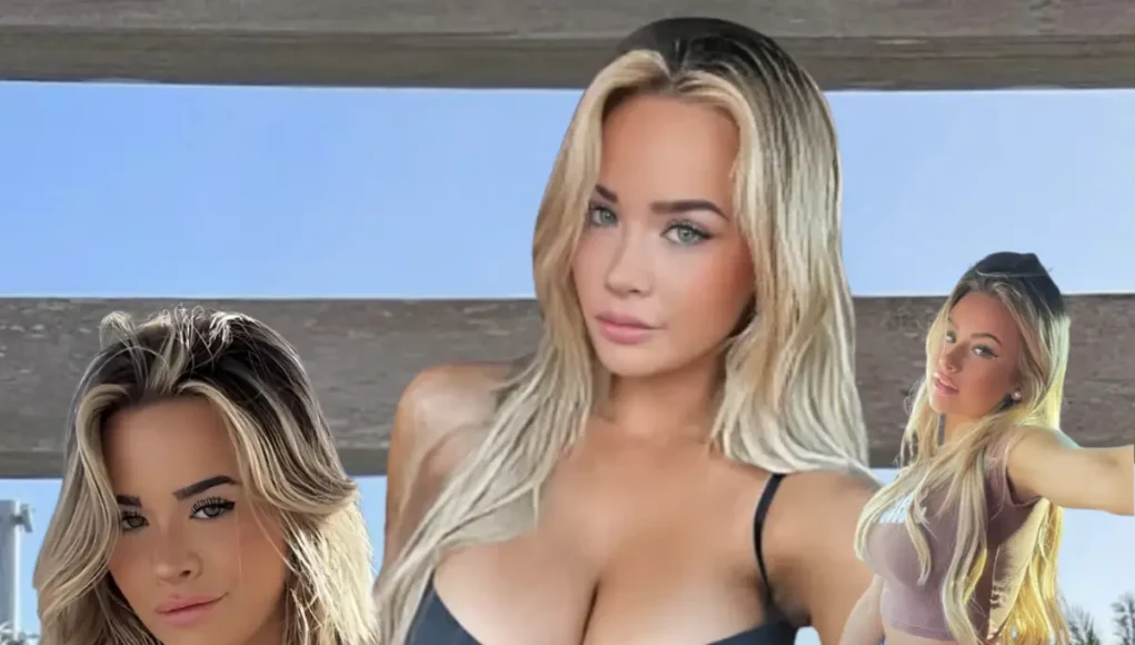 Emily Elizabeth posing indoors in a colorful micro bikini on a white couch.